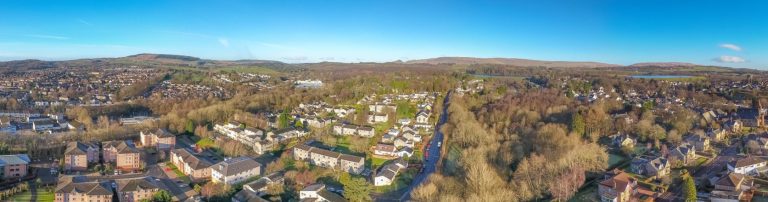 Milngavie as a desirable area on the edge of countryside & still well connected to the other parts of Scotland